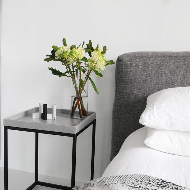 Concrete top outlet bedside table